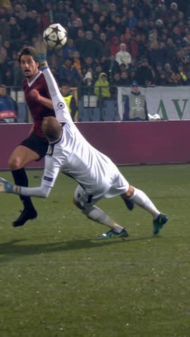 Own shirt example at 0:02: the scorer lifts the ball over the onrushing keeper
