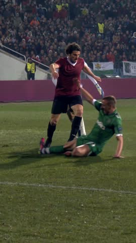 Own shirt example at 0:09: the scorer sits the second defender down